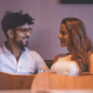 Couple Hanging Out At Table